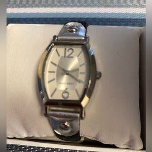 Nine West Ladies watch with black leather band.